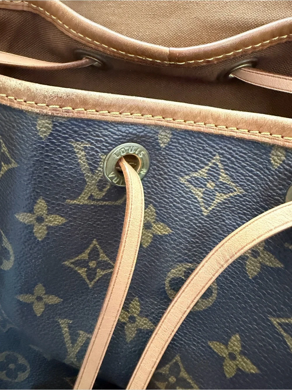 Louis Vuitton Monogram Canvas Drawstring Backpack with Tan Trim